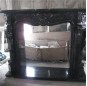 Black galaxy granite fireplace